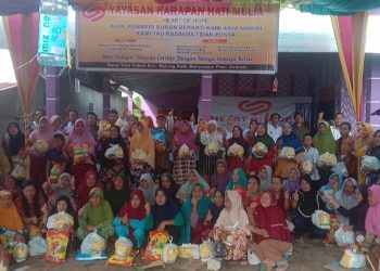 Yayasan Harapan Hati Mulia Bagikan 100 Paket Sembako Untuk Kaum Duafa di Desa Taja Indah