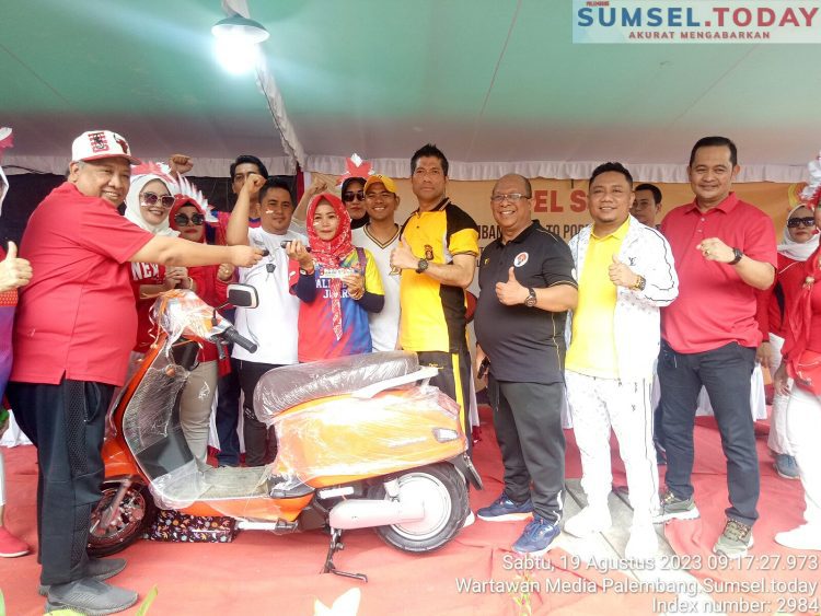 Yanti Humas Koni Kota Palembang Bawa Pulang Doorprize Satu Unit Motor Listrik