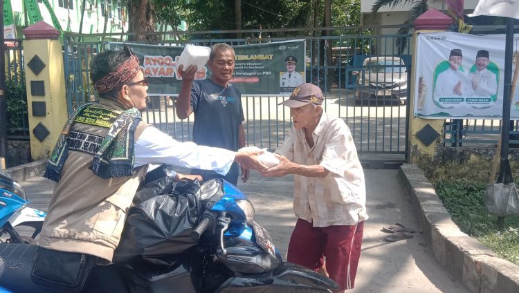 Forum Cakar Sriwijaya Menggelar jumat Barokah Bagikan 100 Paket Kepada Dhuafa